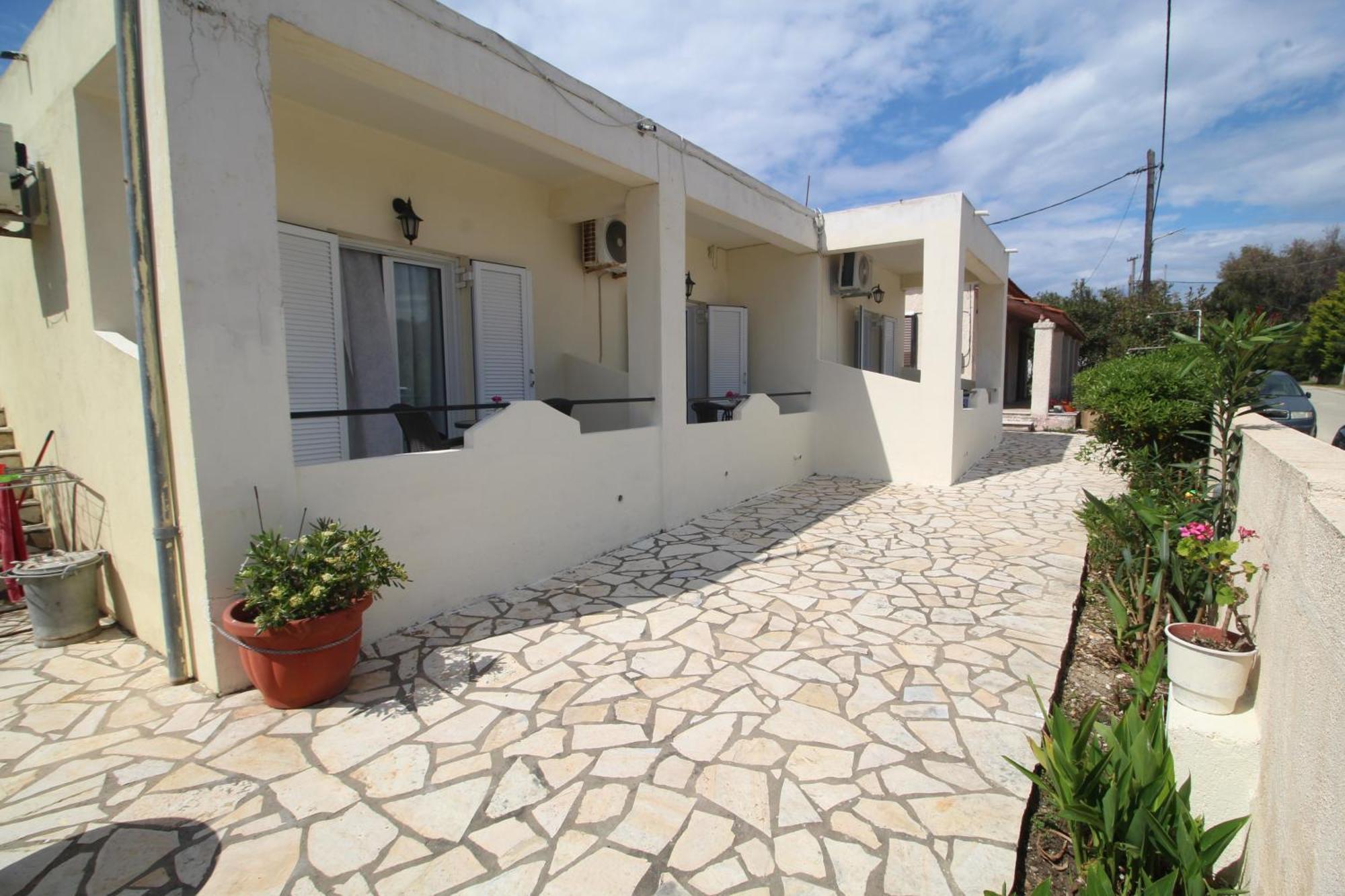 Tony'S Apartments Агиос-Георгиос Экстерьер фото